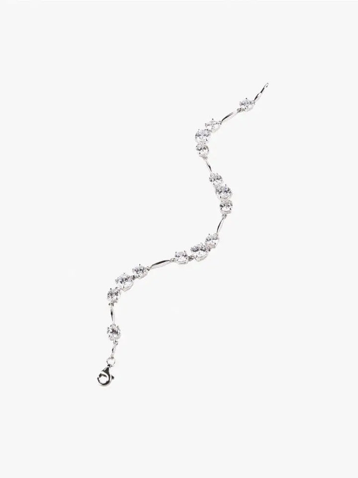 3 SOLITAIRE ATTACHED TENNIS BRACELET