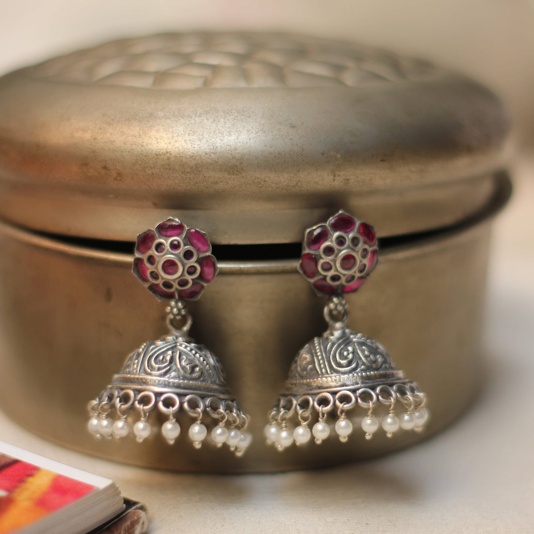 Antique Silver Jhumka Earrings with Red Gemstones