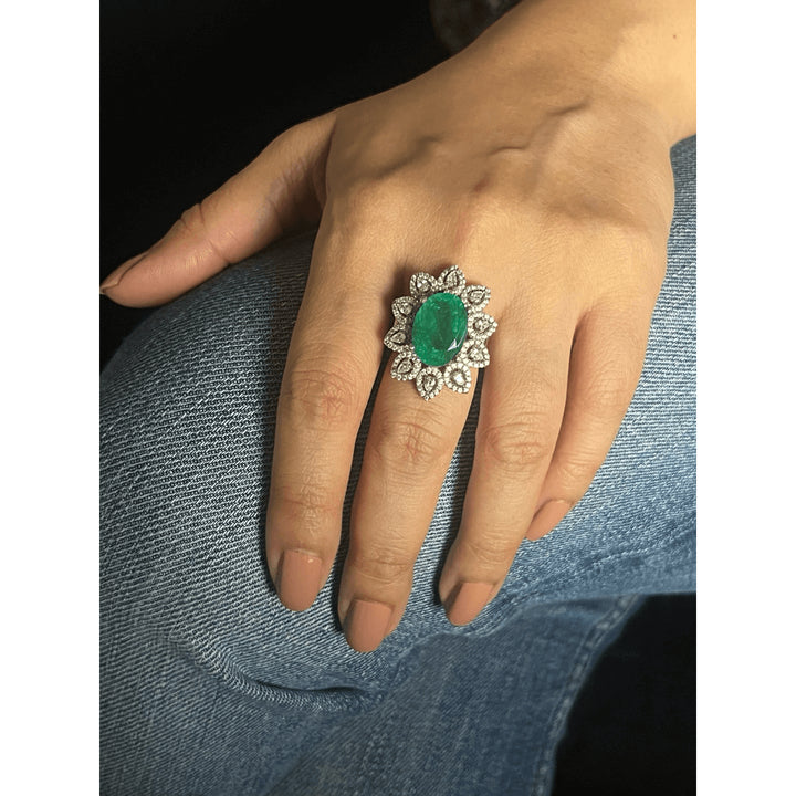 GREEN OVAL COCKTAIL RING WITH PEAR DIAMOND HALO