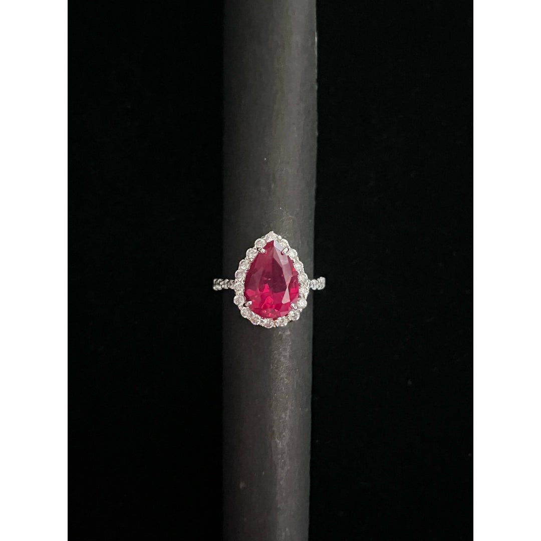 RED PEAR WITH DIAMOND HALO AND DIA BAND