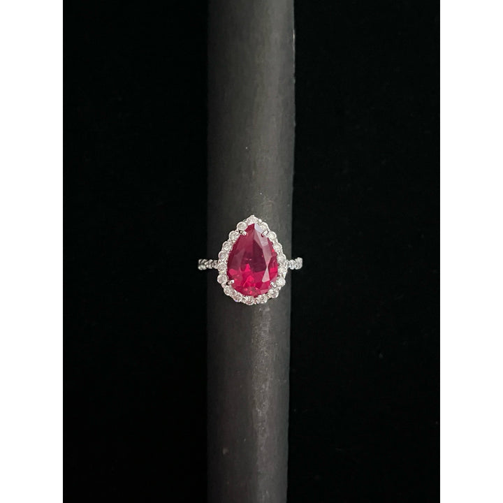 RED PEAR WITH DIAMOND HALO AND DIA BAND