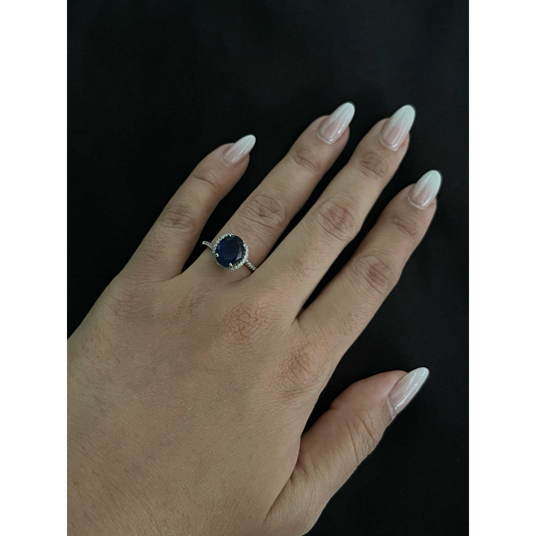 BLUE OVAL WITH TWISTED DIAMOND BAND